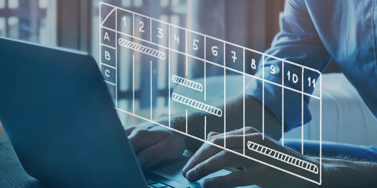 A person on their laptop with a chart graphic in between him and the screen.